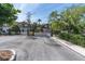 Gated community entrance with well-maintained landscaping ensuring privacy and security at 4965 Anniston Cir, Tampa, FL 33647