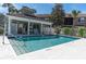 Community pool with a covered lounge area, providing a refreshing retreat for residents at 4965 Anniston Cir, Tampa, FL 33647