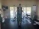 Community gym with weight training system, treadmill and access to pool at 4965 Anniston Cir, Tampa, FL 33647