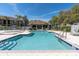 Inviting community swimming pool with ample deck space, ideal for soaking up the sun at 4965 Anniston Cir, Tampa, FL 33647