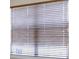 Close up shot of window blinds, which provide privacy and light control at 4965 Anniston Cir, Tampa, FL 33647
