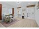 Dining area featuring a table set for four, with decor, and an open concept to the kitchen at 5108 N Suwanee Ave, Tampa, FL 33603