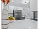 Bright, modern kitchen featuring sleek countertops, stainless appliances, and lots of cabinet space at 5108 N Suwanee Ave, Tampa, FL 33603