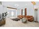 Cozy living room with hardwood floors, stylish furniture, and a bright, open layout at 5108 N Suwanee Ave, Tampa, FL 33603