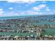 Aerial shot of a waterfront community on a clear day with boats docked along the canals at 556 Johns Pass Ave, Madeira Beach, FL 33708