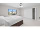 Bedroom featuring a window view, closet and ceiling fan at 556 Johns Pass Ave, Madeira Beach, FL 33708