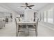 Dining area flowing into an updated kitchen, perfect for hosting and everyday Gathering meals at 556 Johns Pass Ave, Madeira Beach, FL 33708