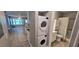 Modern bathroom featuring a walk-in shower, a stackable washer and dryer, and nice finishes at 5725 80Th N St # 107, St Petersburg, FL 33709