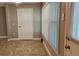 Bedroom with tile flooring and large window at 5725 80Th N St # 107, St Petersburg, FL 33709