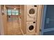 Convenient laundry room with stacked washer and dryer units, maximizing space at 5725 80Th N St # 107, St Petersburg, FL 33709