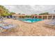 Beautiful pool area with lounge chairs, perfect for soaking up the sun and relaxing at 5725 80Th N St # 107, St Petersburg, FL 33709