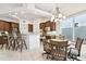 Bright kitchen and breakfast nook with granite counters and wood cabinetry at 601 Viento De Avila, Tampa, FL 33613