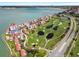 Expansive aerial view of waterfront residences, a golf course, and a marina at 6140 Sun Blvd # 7, St Petersburg, FL 33715
