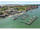 Beautiful aerial view of a marina with many boats docked in the turquoise water at 6140 Sun Blvd # 7, St Petersburg, FL 33715