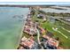 Breathtaking aerial view of the community, nestled along the water, golf course, and nearby beaches at 6140 Sun Blvd # 7, St Petersburg, FL 33715