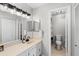 Clean bathroom with a vanity, mirrors, and a toilet at 6140 Sun Blvd # 7, St Petersburg, FL 33715