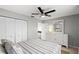 Bright bedroom featuring neutral tones, fan and closet at 6140 Sun Blvd # 7, St Petersburg, FL 33715