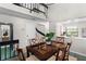 Dining room area looking toward kitchen passthrough and stairway at 6140 Sun Blvd # 7, St Petersburg, FL 33715