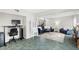Cozy living room features tile floors, comfortable seating, and natural light at 6140 Sun Blvd # 7, St Petersburg, FL 33715