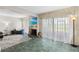 Comfortable living room with fireplace and scenic outdoor views at 6140 Sun Blvd # 7, St Petersburg, FL 33715