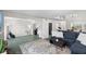 Open floor plan showcases spacious living room connected to the dining area at 6140 Sun Blvd # 7, St Petersburg, FL 33715