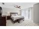 Spacious main bedroom with large windows, a ceiling fan, and an inviting, restful ambiance at 6140 Sun Blvd # 7, St Petersburg, FL 33715