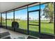 Inviting screened patio with golf course views, perfect for relaxation and outdoor enjoyment at 6140 Sun Blvd # 7, St Petersburg, FL 33715