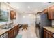 Updated kitchen boasts stainless steel appliances, granite countertops, a breakfast nook, and custom cabinets at 6727 Burlington N Ave, St Petersburg, FL 33710