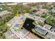 Aerial view of home near pond with fountain and community pool with ample parking at 6732 Rocky Park St, Tampa, FL 33625