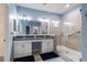 Bathroom featuring double sinks, granite countertops, and a glass enclosed shower at 6732 Rocky Park St, Tampa, FL 33625