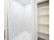 Bathroom featuring stand-up shower and a shelf at 7322 Mako Dr, Hudson, FL 34667