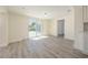 Open floorplan space provides access to backyard, kitchen and entry to another room at 7322 Mako Dr, Hudson, FL 34667
