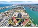 Aerial view of the condo complex located near waterfront, beaches and town at 8711 Blind Pass Rd # 207A, St Petersburg, FL 33706