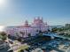 Grand hotel with intricate architecture, palm trees, and ocean views, promising a luxurious stay at 8711 Blind Pass Rd # 207A, St Petersburg, FL 33706