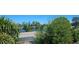 Scenic view showcasing the property's lush greenery and tranquil waterfront at 9815 47Th N Ave # 306, St Petersburg, FL 33708