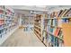 Well-stocked library featuring floor-to-ceiling shelves and a cozy reading area at 9815 47Th N Ave # 306, St Petersburg, FL 33708