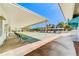 Outdoor shuffleboard court with benches for community enjoyment and recreation at 9815 47Th N Ave # 306, St Petersburg, FL 33708
