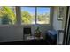 Bright sunroom with tranquil water views offering a serene space to relax at 9815 47Th N Ave # 306, St Petersburg, FL 33708