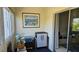 Inviting sunroom with artwork and peaceful ambiance at 9815 47Th N Ave # 306, St Petersburg, FL 33708