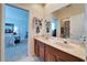 Double vanity bathroom that provides convenience and ample counter space for grooming and storage at 10220 Deercliff Dr, Tampa, FL 33647