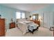 Inviting bedroom with calm colors, offering a tranquil retreat and relaxing ambiance at 10220 Deercliff Dr, Tampa, FL 33647