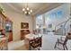 Spacious dining area with large windows, high ceilings, and elegant decor at 10220 Deercliff Dr, Tampa, FL 33647