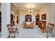 Formal dining room featuring classic wooden furniture and a decorative chandelier at 10220 Deercliff Dr, Tampa, FL 33647
