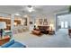 Open-concept living space with a breakfast bar and seamless flow to other rooms at 10220 Deercliff Dr, Tampa, FL 33647