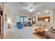 Cozy living room with an open layout, comfortable seating, and a view to the lanai at 10220 Deercliff Dr, Tampa, FL 33647