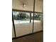 Covered patio with ceiling fan overlooking screened-in pool and outdoor living space at 10220 Deercliff Dr, Tampa, FL 33647