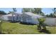 Charming one-story home with well-maintained landscaping, a white fence, and great curb appeal at 105 2Nd Ne Ave, Lutz, FL 33549