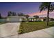 Charming single-story home featuring manicured lawn, neutral color palette and attached two car garage at 105 2Nd Ne Ave, Lutz, FL 33549