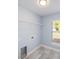 Laundry room features tiled floors, window and hookups at 105 2Nd Ne Ave, Lutz, FL 33549