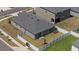 Well-maintained backyard features new gray paint, vinyl fencing, and manicured lawn at 1050 Davis Heather Cir, Seffner, FL 33584